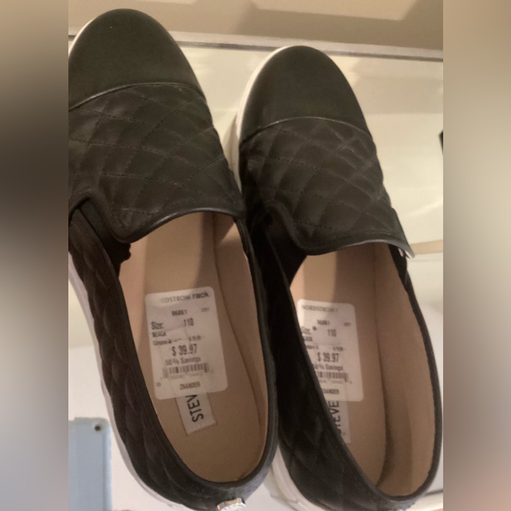 Adorable black Steve Madden flats with rubber soles
